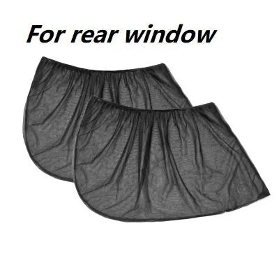 Set of grey non-woven fabric car side window sunshades with elastic edges on a car window.