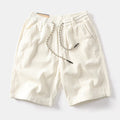 Men's retro-style cargo shorts in straight-leg fit with polyester fabric