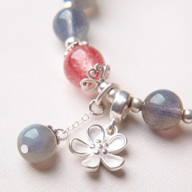 Grey moonlight silver women's bracelet with 7.5mm crystal and honeysuckle and animal charms.