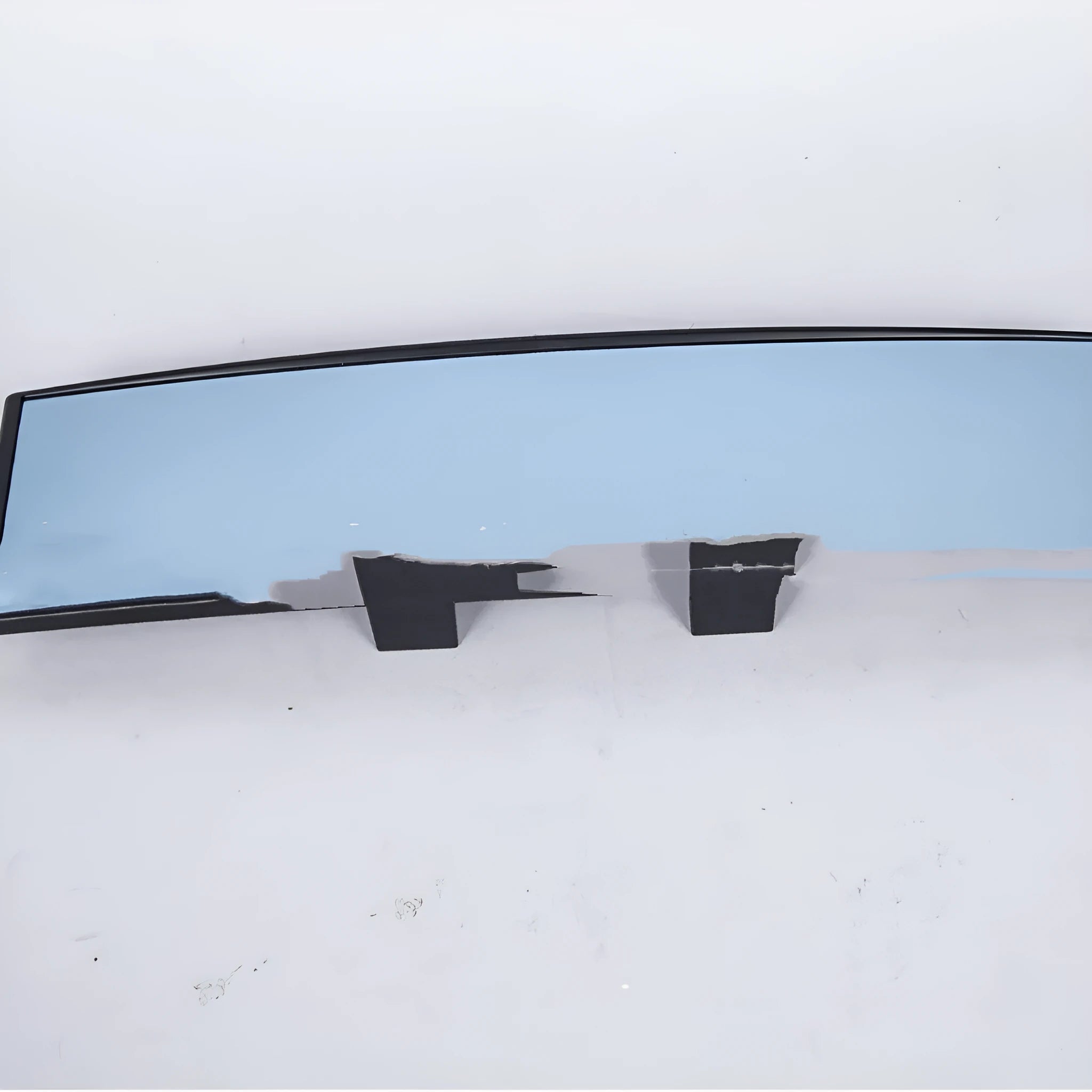 Curved blue filter car rearview mirror with wide-angle design and snap-on fitting, shown on a white background.