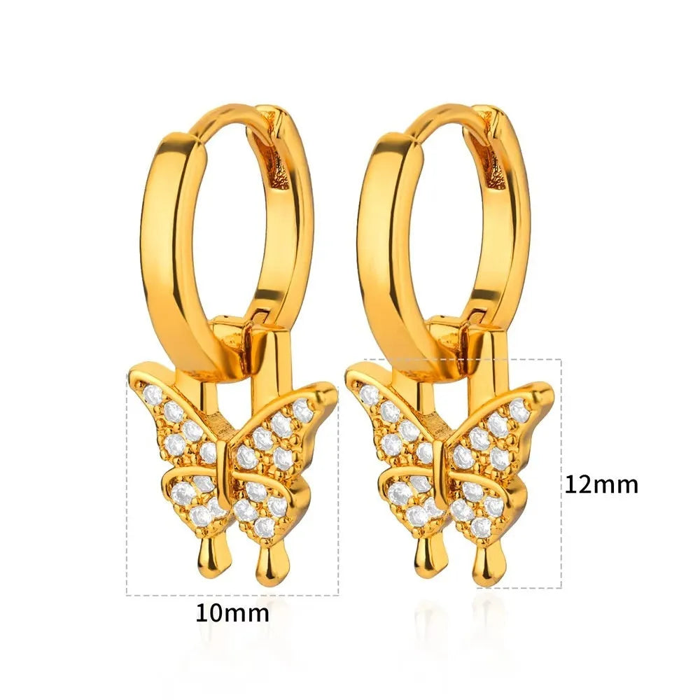 Geometric copper butterfly earrings with a heart, bow, and star details in a selection of colour finishes.
