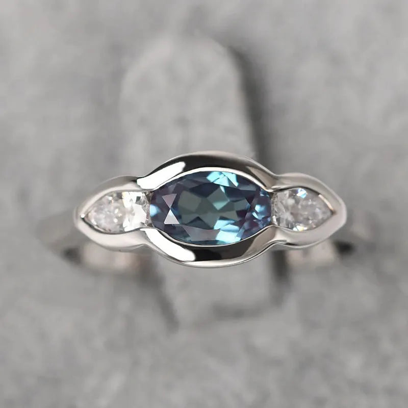 Women's geometric ellipse fashion ring with zircon stones and white gold plating