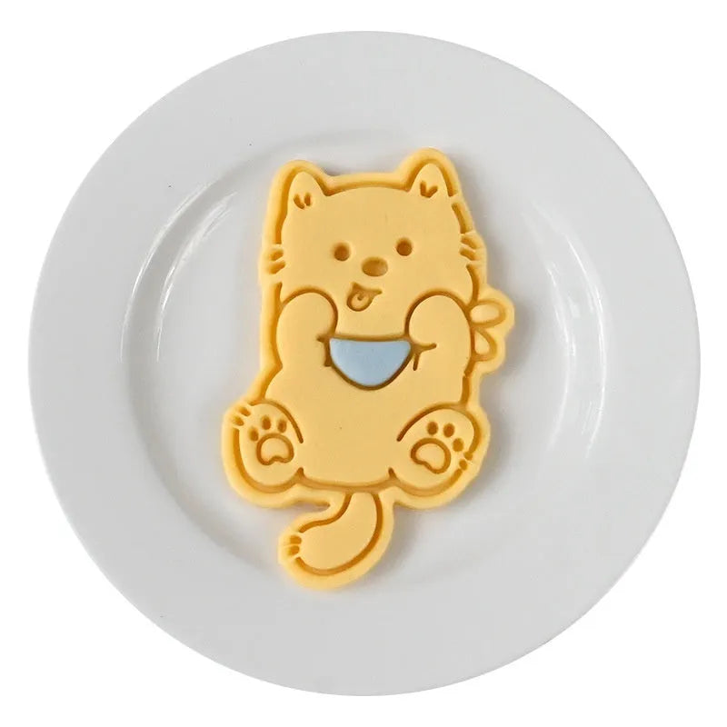 Plastic cartoon biscuit mould for 3D puppy-shaped treats with seven decorative designs