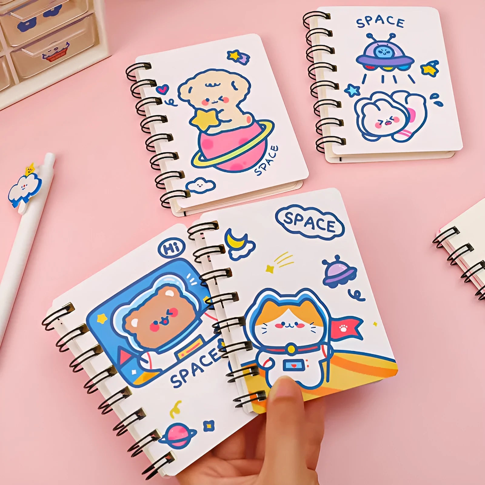Astronaut-themed portable pocket flipper notebook showing 10.5x8cm size and cover design options