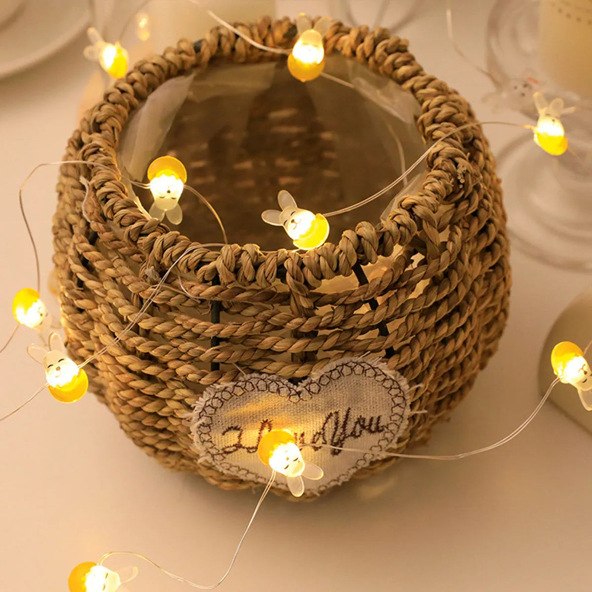 Easter LED bunny string lights with carrot and transparent white rabbit bulbs on a dark background