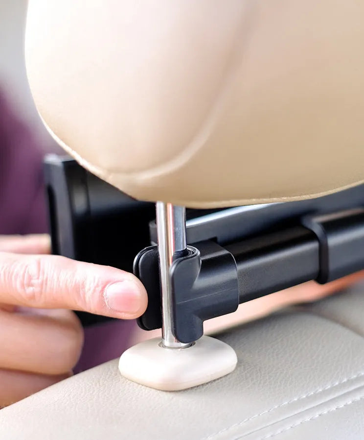 Black universal car phone and iPad holder mounted on a car seat headrest.