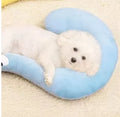 Blue U-shaped pet pillow for cat neck support with moon design on cloth material