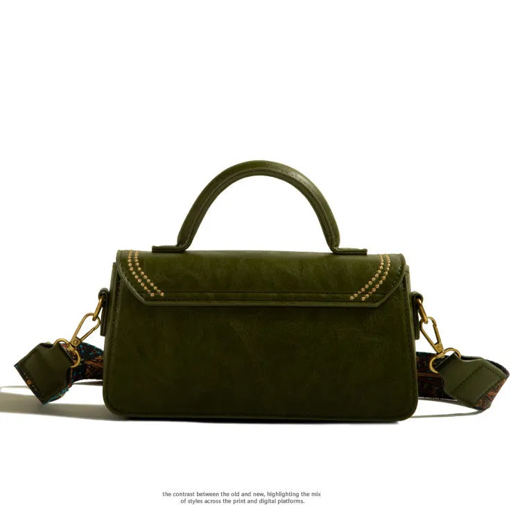 Brown retro women's messenger bag with shoulder strap, showing external sandwich pocket and square vertical shape.