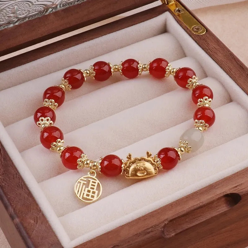 Glass floral bracelet with ice crack pattern and zodiac modelling in red, pink, or white bead options