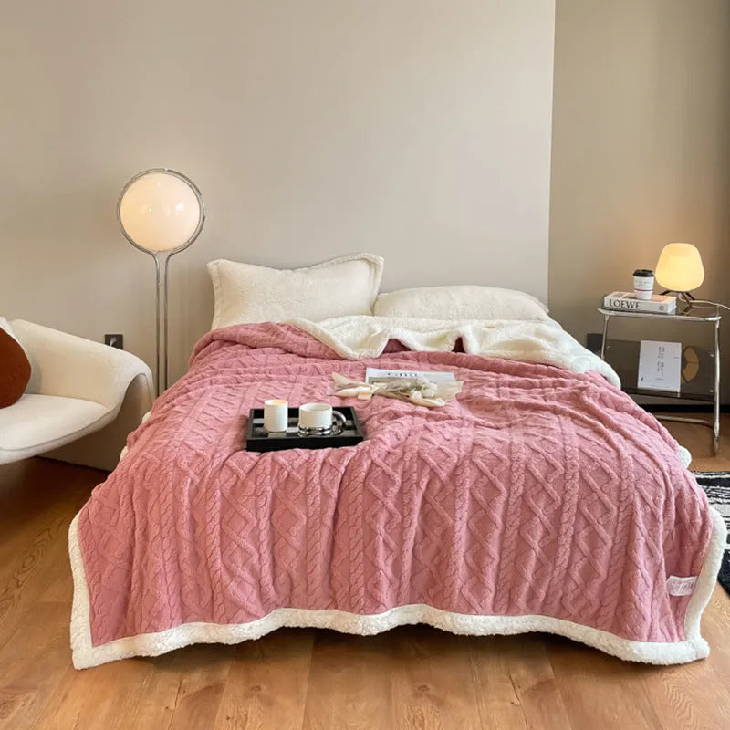 Polyester thermal flannel blanket in beige colour, shown folded to display its thick texture and modern style