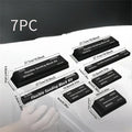 Set of seven black textured metal EVA frosted modelling blocks for miniature bases.