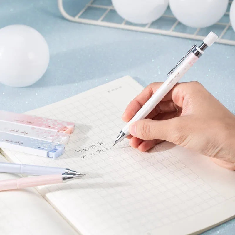 Cartoon automatic pencil set containing three propelling pencils and three HB refill boxes