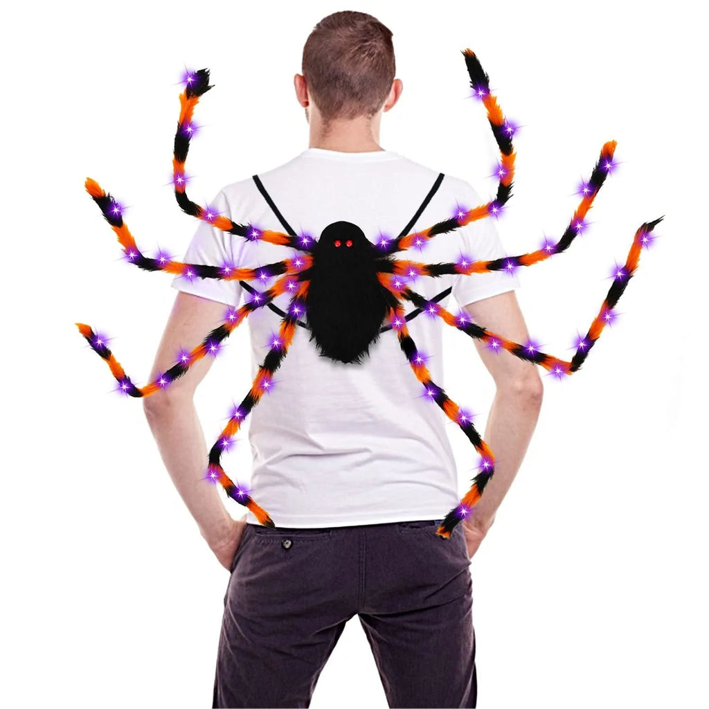 Halloween spider plush backpack with LED lights in orange purple colour, showing glow effect and backpack straps