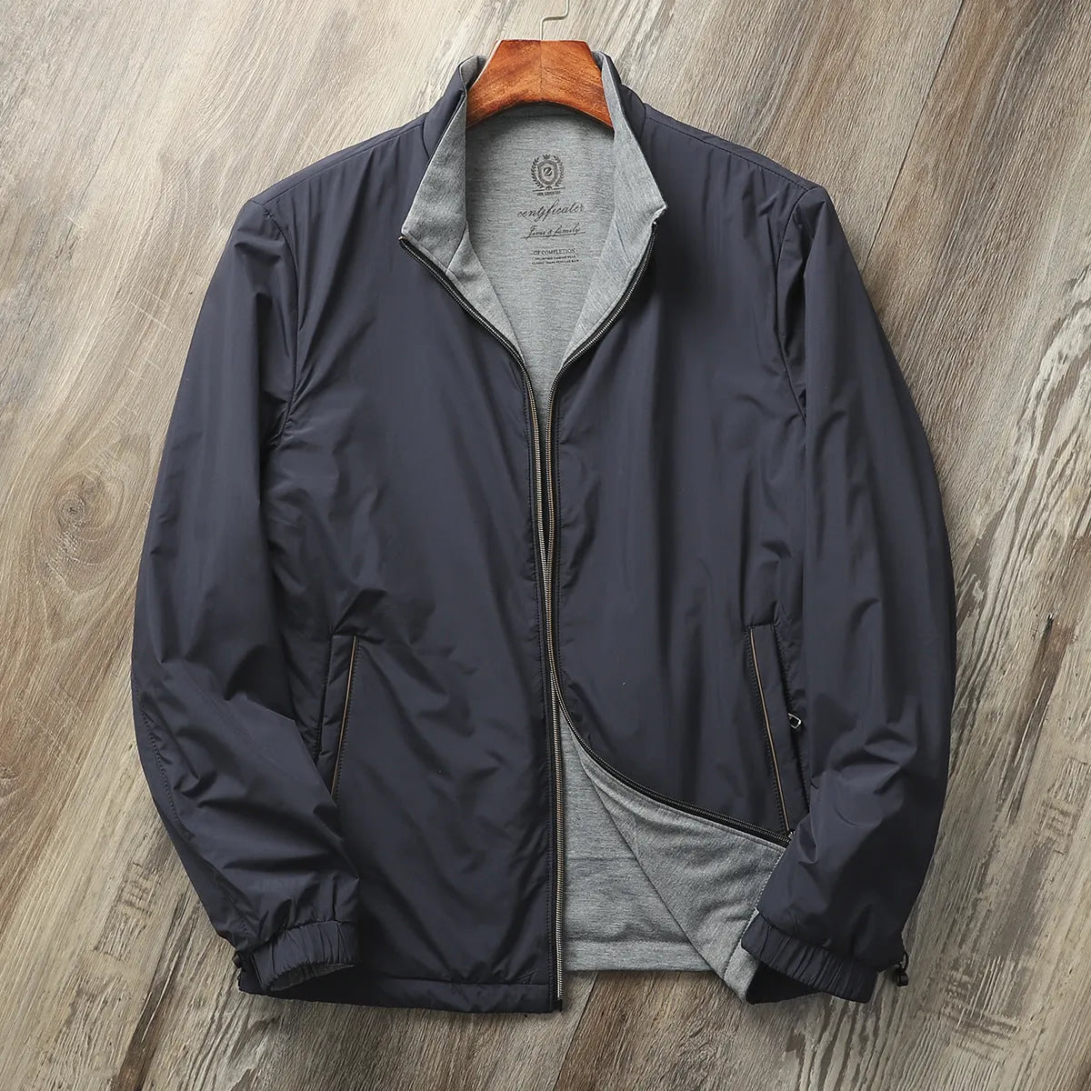 Men's stand collar casual jacket in army green with a simple design and regular sleeves.
