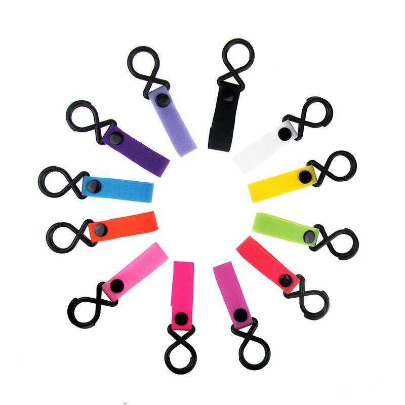 A selection of luggage Velcro hooks in various colours including red, blue, green, and yellow on a white background