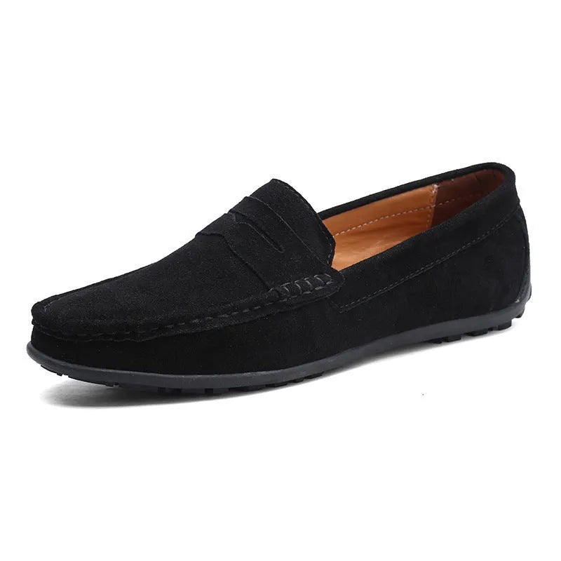 Men's brown suede casual loafers with flat rubber sole and round toe on a white background