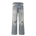 Men's blue straight leg jeans with ripped detailing on a cotton blend fabric.