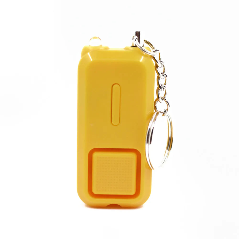 Compact personal safety alarm device in multiple colours showing 65x30x12mm dimensions