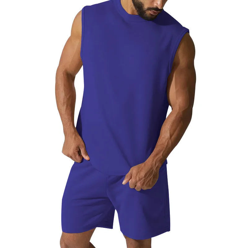 Men's sleeveless cotton blend sports suit showing sleeveless top and matching shorts in a solid colour.