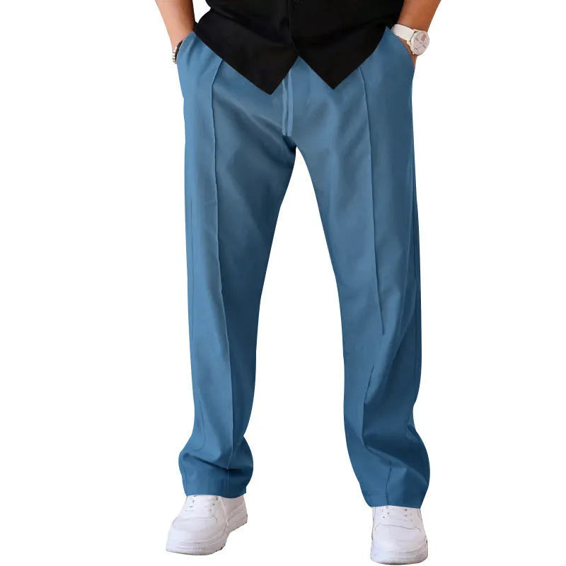 Men's loose straight drawstring trousers in waffle polyester fabric, shown in multiple colour options