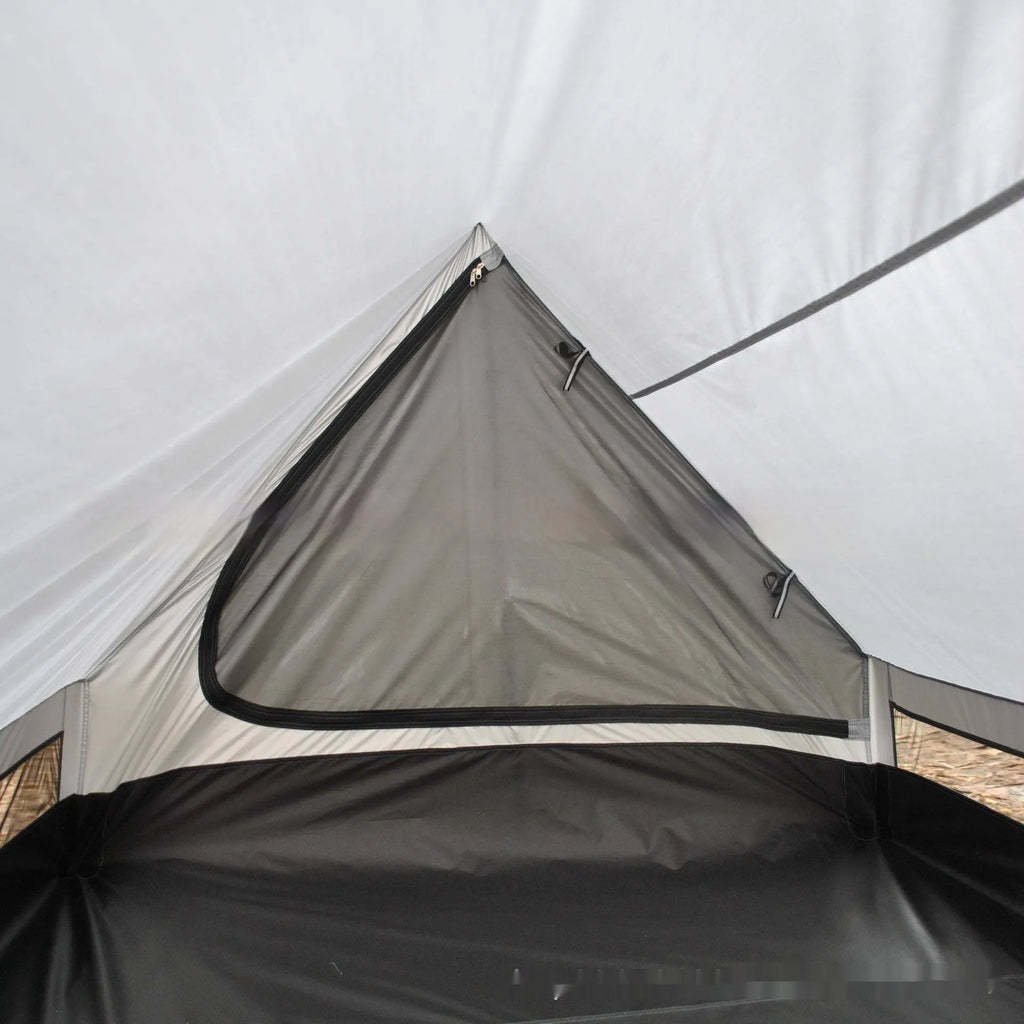 Brown or white A-line pole-free cabin tent for hiking, shown packed and pitched.