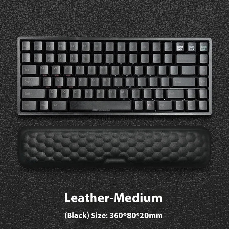 Grey and black memory foam mouse wrist pads with silicone bases, shown in cloth and leather cover options.