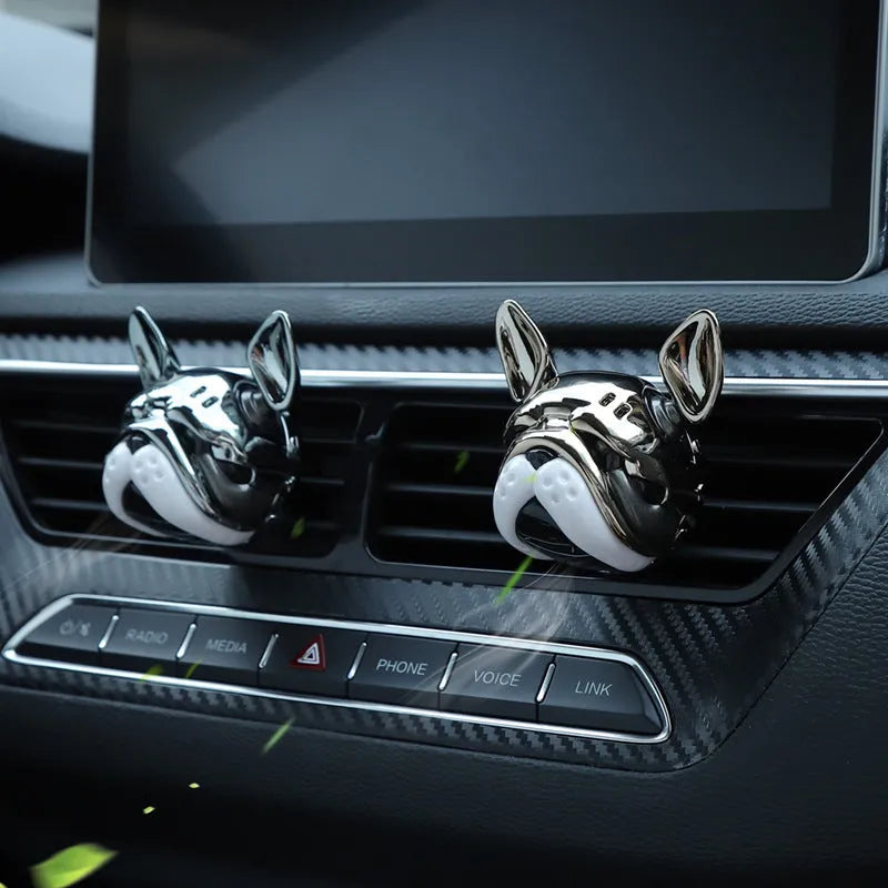 Car vent aromatherapy ornament with Gulong Ocean fragrance in red colour, clipped to a car vent, with balm refills.