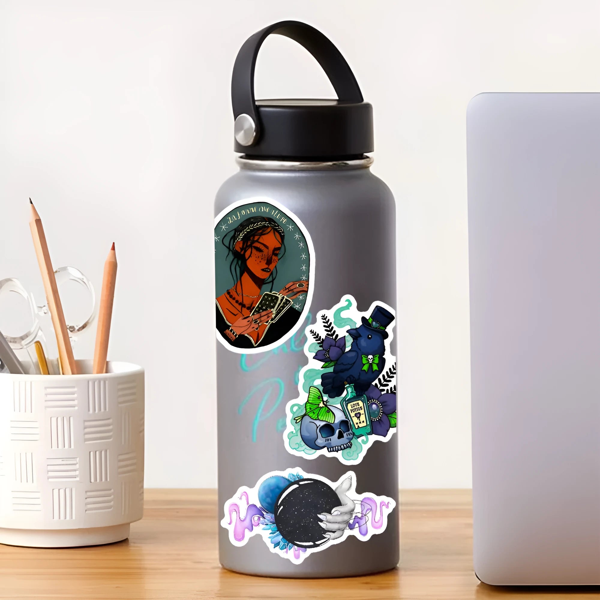 Assorted colourful waterproof PVC stickers for laptops and smooth surfaces, sizes 3 to 8 cm.
