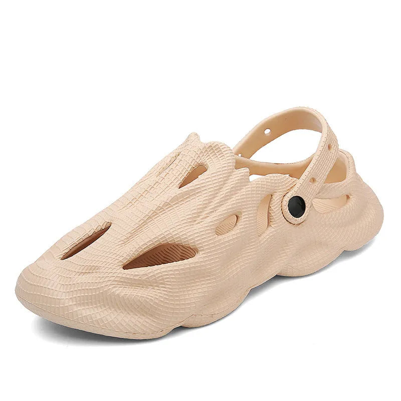EVA soft men's summer beach shoes in grey colour on sandy surface