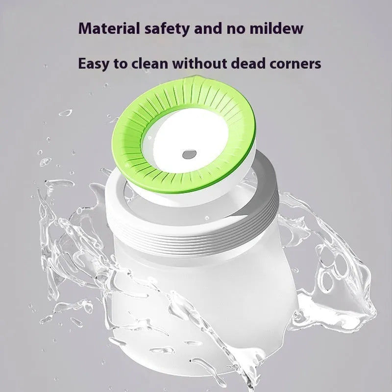 Green suspended pet water bowl for medium and small dogs and cats on a white plate