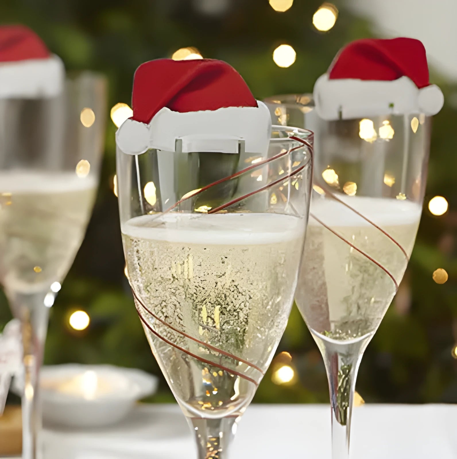 Set of 10 red Santa hat covers for wine glasses, non-woven fabric, 6x3.6 cm