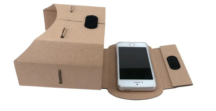 Corrugated cardboard virtual reality glasses for smartphones showing 3D content.