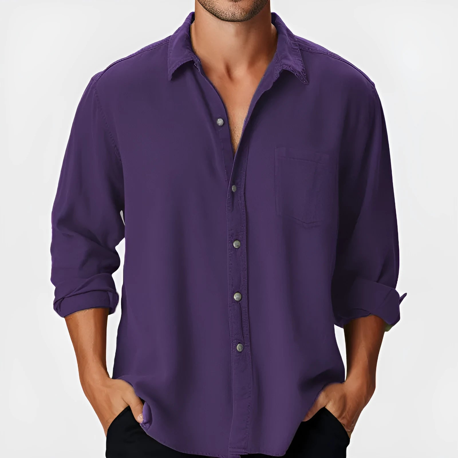 A man's loose-fitting long sleeve beach shirt with a stand collar, shown in a solid colour.