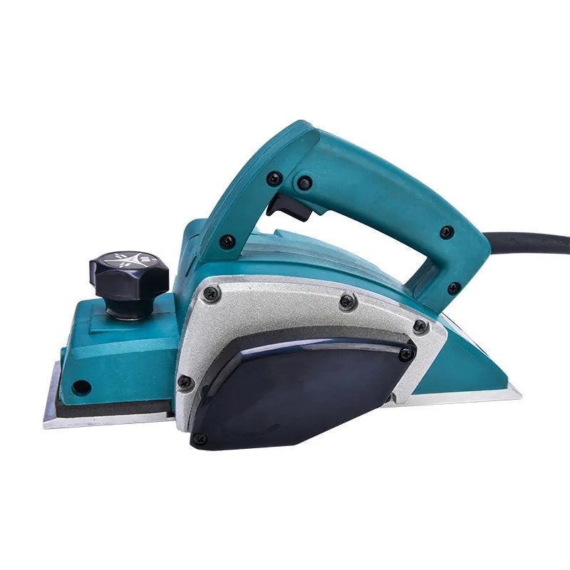 Red desktop electric wood planer with aluminium housing showing 82mm planing width