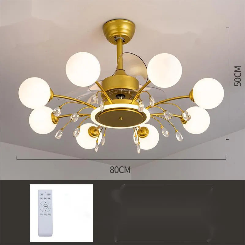 Gold and black ceiling fan lamp with acrylic shade and metal blades, showing remote control