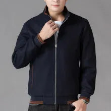 Men's grey polyester fleece autumn jacket with long sleeves and a stick pocket.