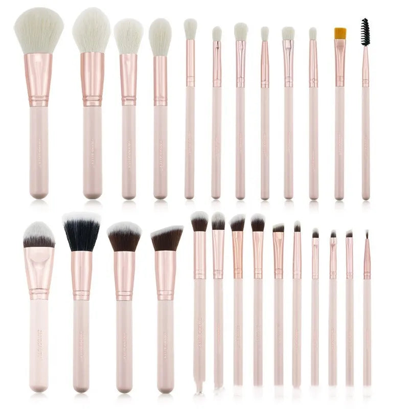 26 pink wooden-handle makeup brushes arranged in a grey PU zip case.