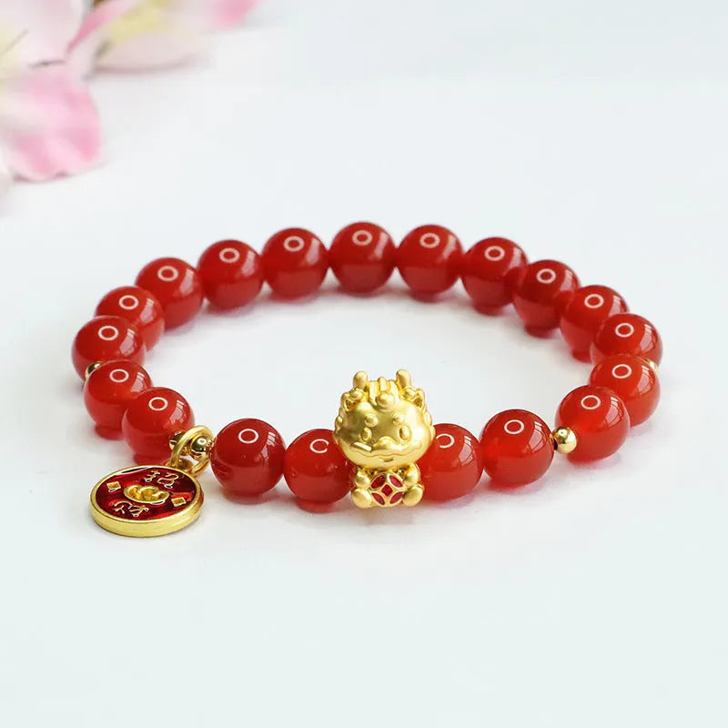 8mm red agate bead bracelet with Dragon charm on black elastic cord.
