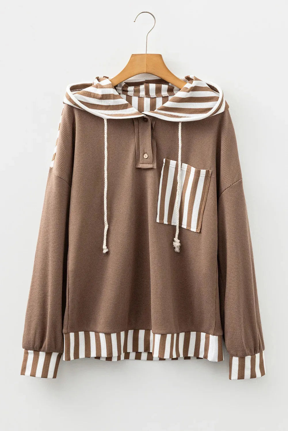 Straw yellow waffle texture hoodie with striped patchwork detail and button neck closure