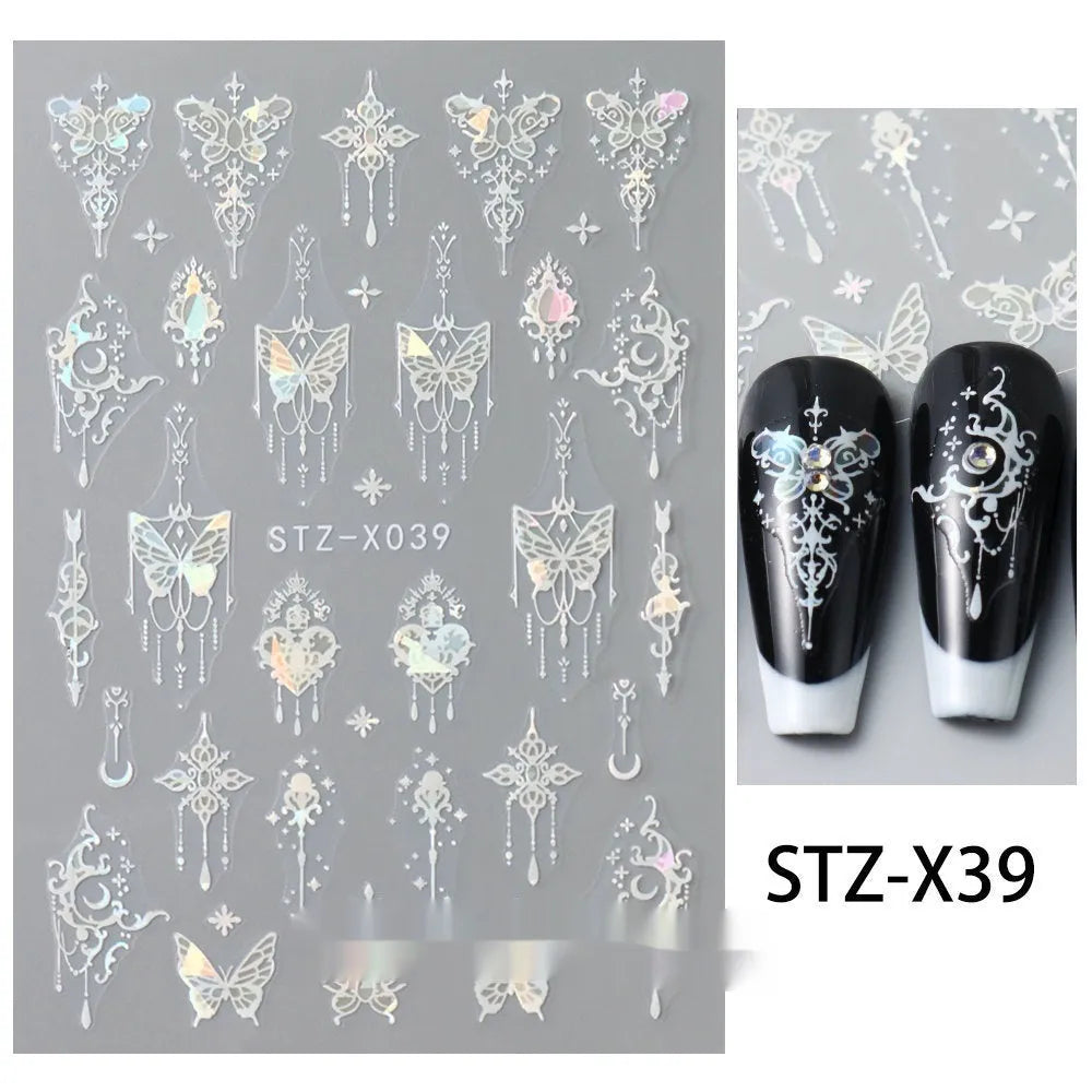 Pack of black and silver strip nail art stickers with cartoon and love pattern designs.