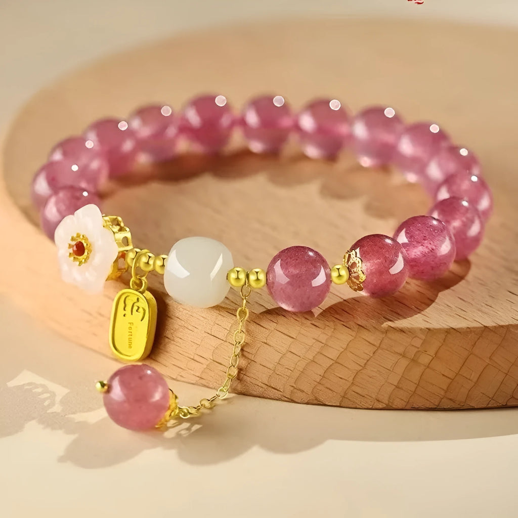 Hetian jade and strawberry quartz crystal bracelet for women showing manual craftsmanship and natural stone variations