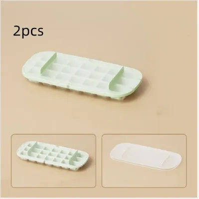 High capacity ice cube tray with grid design and integrated ice shovel storage compartment