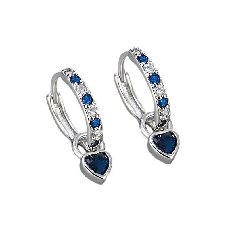 Women's zircon earrings with heart-shaped drops in gold or white gold settings with coloured gemstones