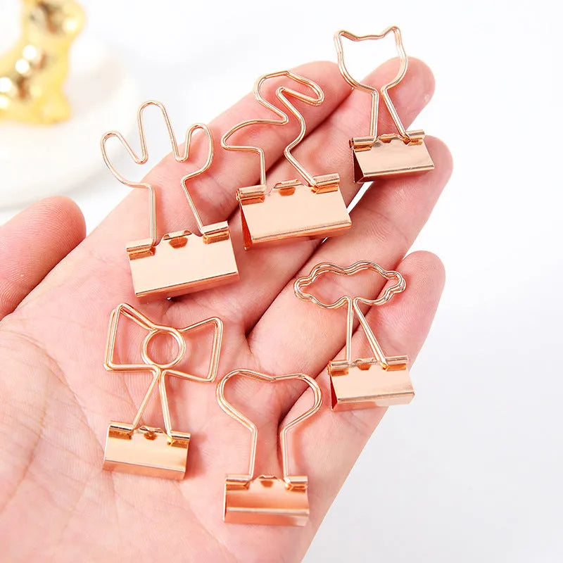 Gold plated metal office clip with decorative long tail design showing flamingo, love, clouds, cat, and cactus motif options