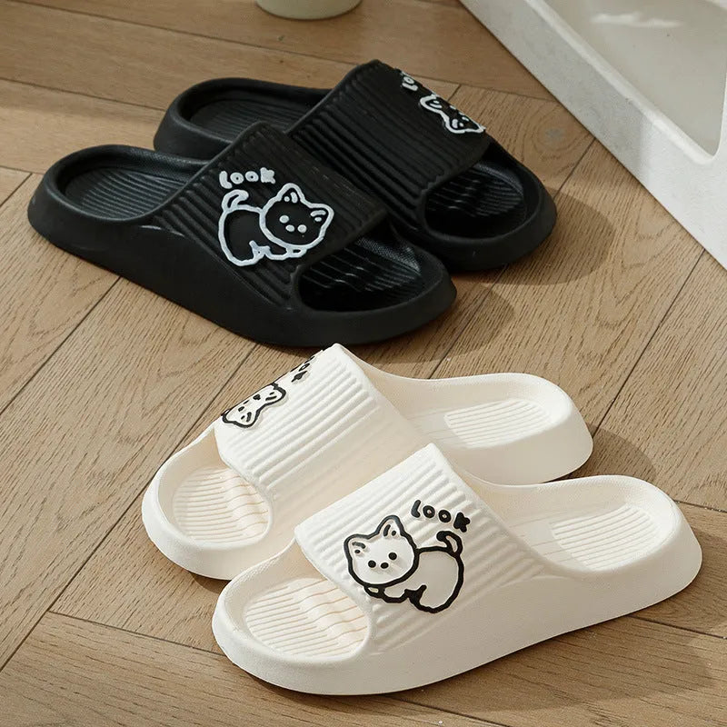 Women's pink cat-themed flip-flop slippers with a thick light blue EVA platform sole.