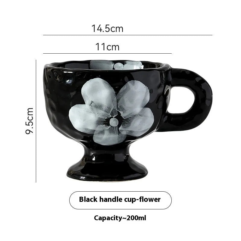 Hand-pinched irregular ceramic mug in solid colour, approximately 250ml capacity