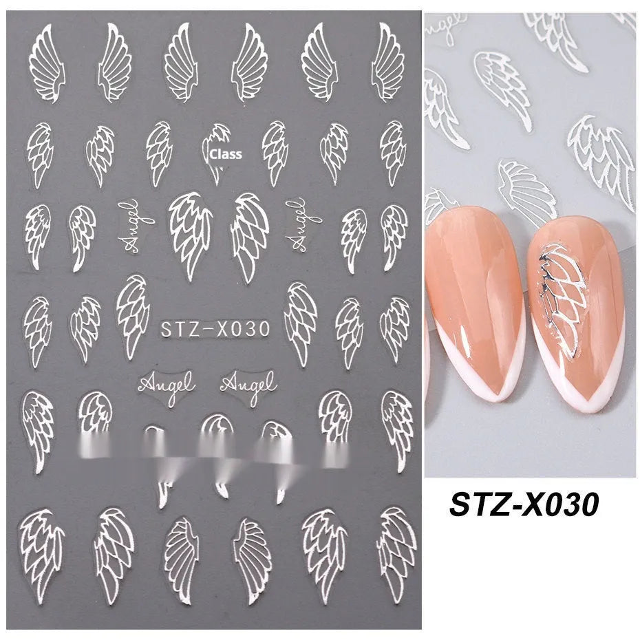 Pack of black and silver strip nail art stickers with cartoon and love pattern designs.