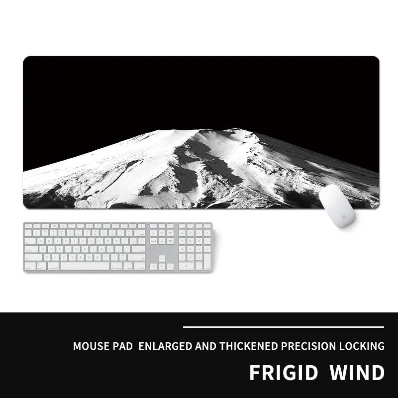 Oversized gaming mouse pad with cold-themed design on natural rubber base