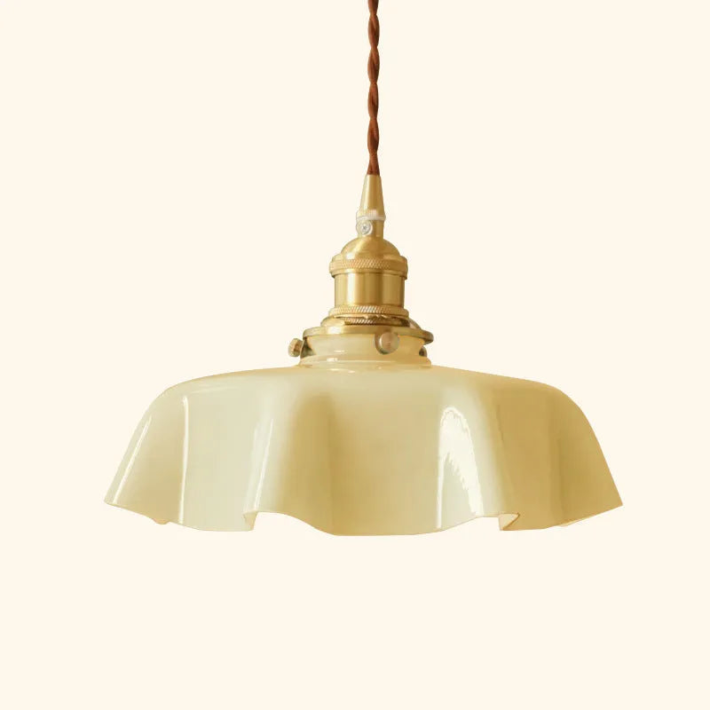 Medieval French style brass chandelier with flower bud details and glass lamp body