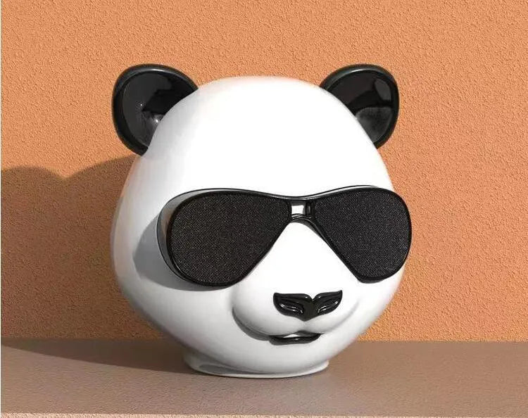 Classic style portable mini Bluetooth speaker with USB port and control buttons.